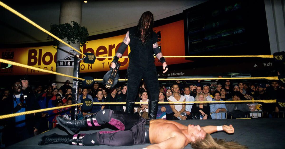 The Undertaker crushes Triple H with a Tombstone Piledriver at Penn Station