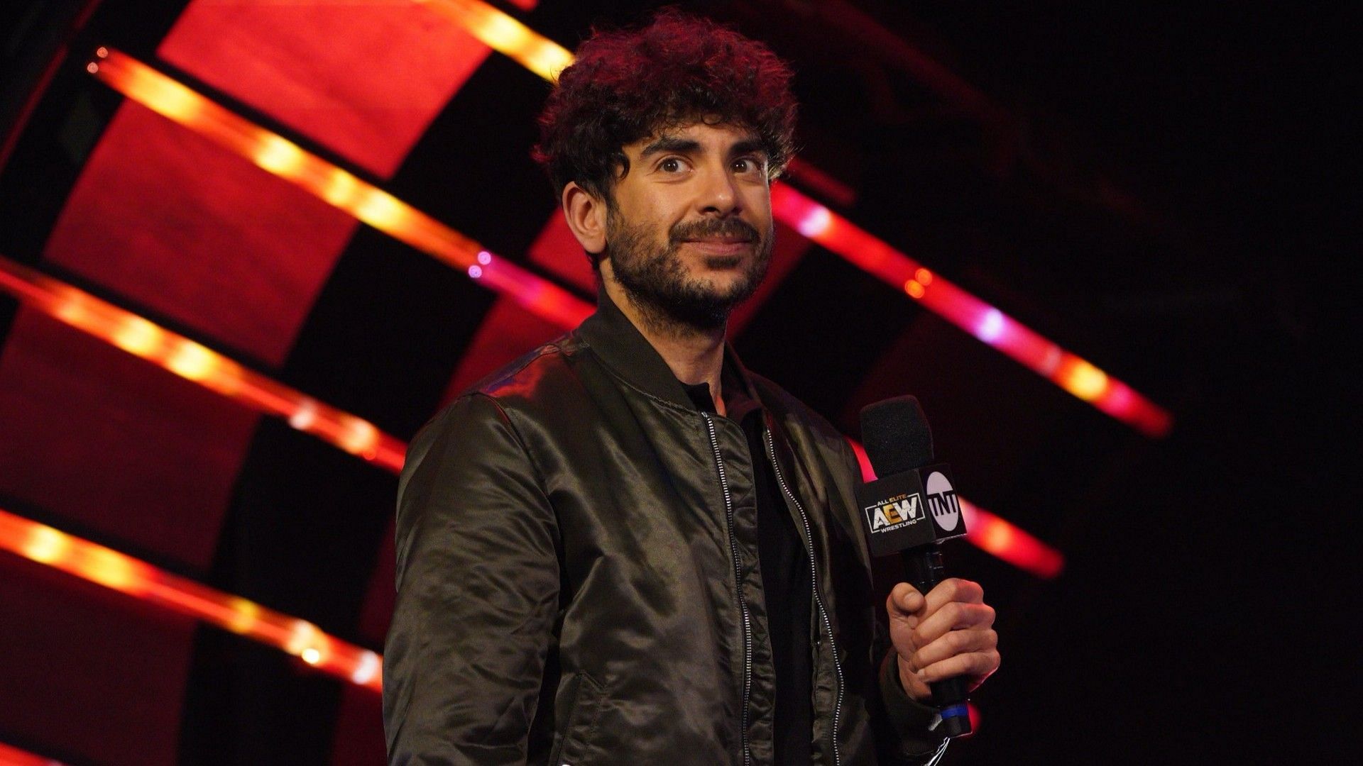 AEW President Tony Khan speaks to fans at Dynamite
