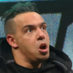 Masked man exposed on SmackDown has ties to Seth Rollins