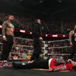 GREENSBORO, NORTH CAROLINA - MAY 18: Jey Uso, Roman Reigns and Jimmy Uso stand tall over Jacob Fatu during Monday Night RAW at Greensboro Coliseum Complex on May 18, 2026 in Greensboro, North Carolina. (Photo by Michael Owens/WWE via Getty Images)